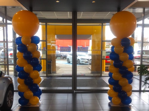 Colonne de ballons jaune et bleu concession voiture
